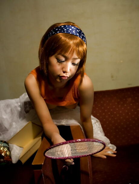 Very attractive japanese youthful Nana Nanami exposing small tits and spreading her legs 